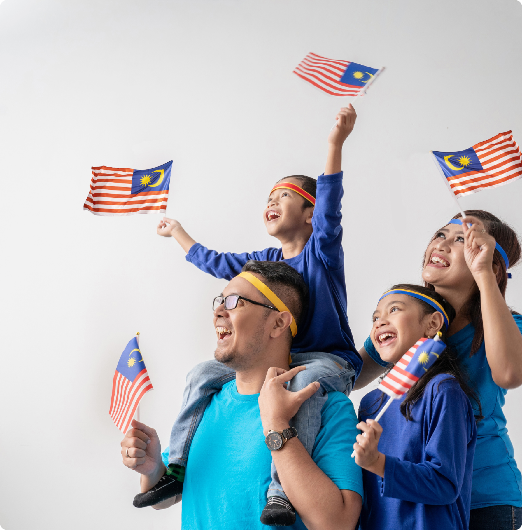 Family with Malaysian flags