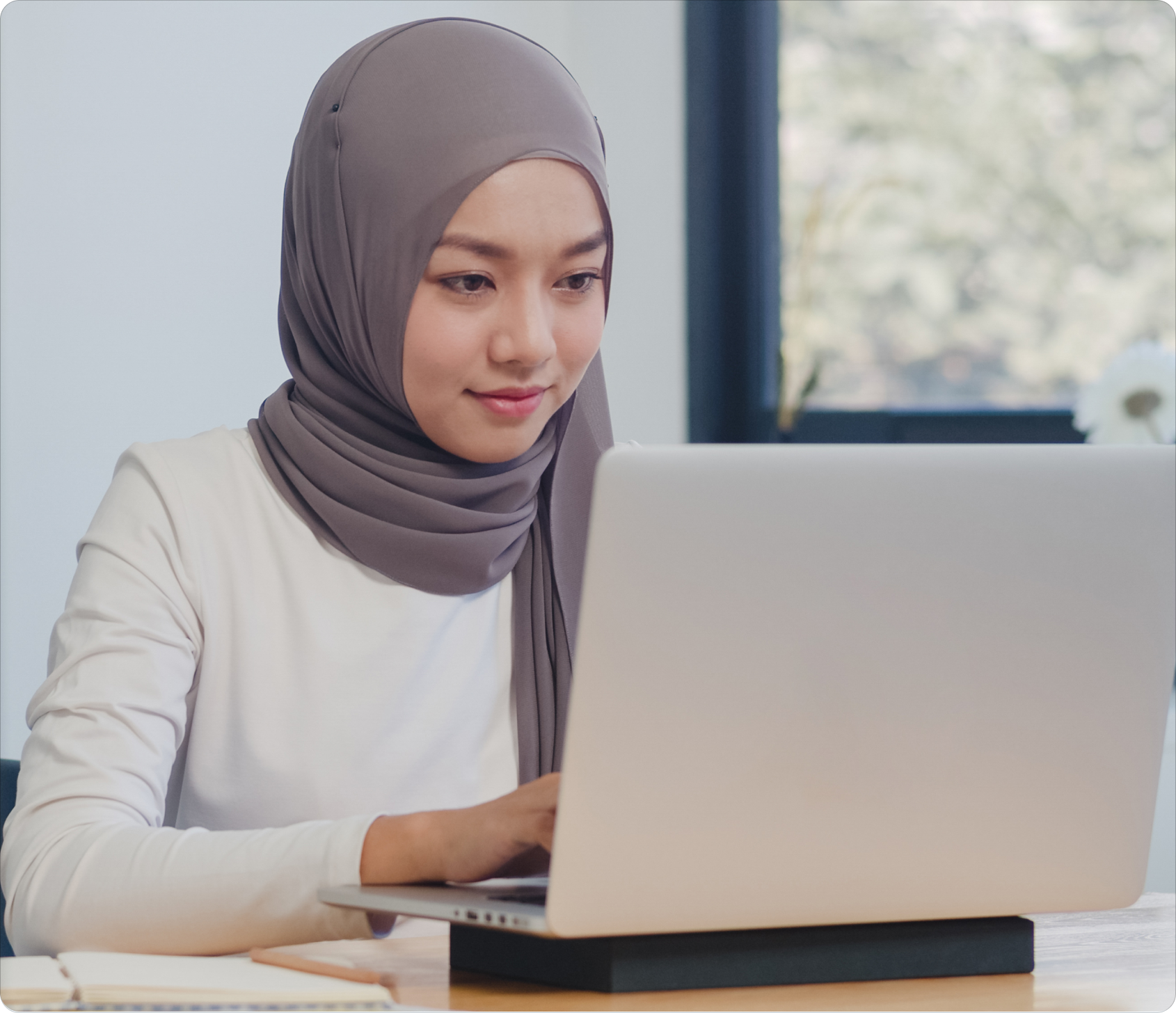 Woman working on a laptop